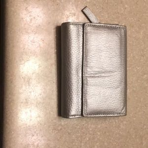 Silver trifold walled